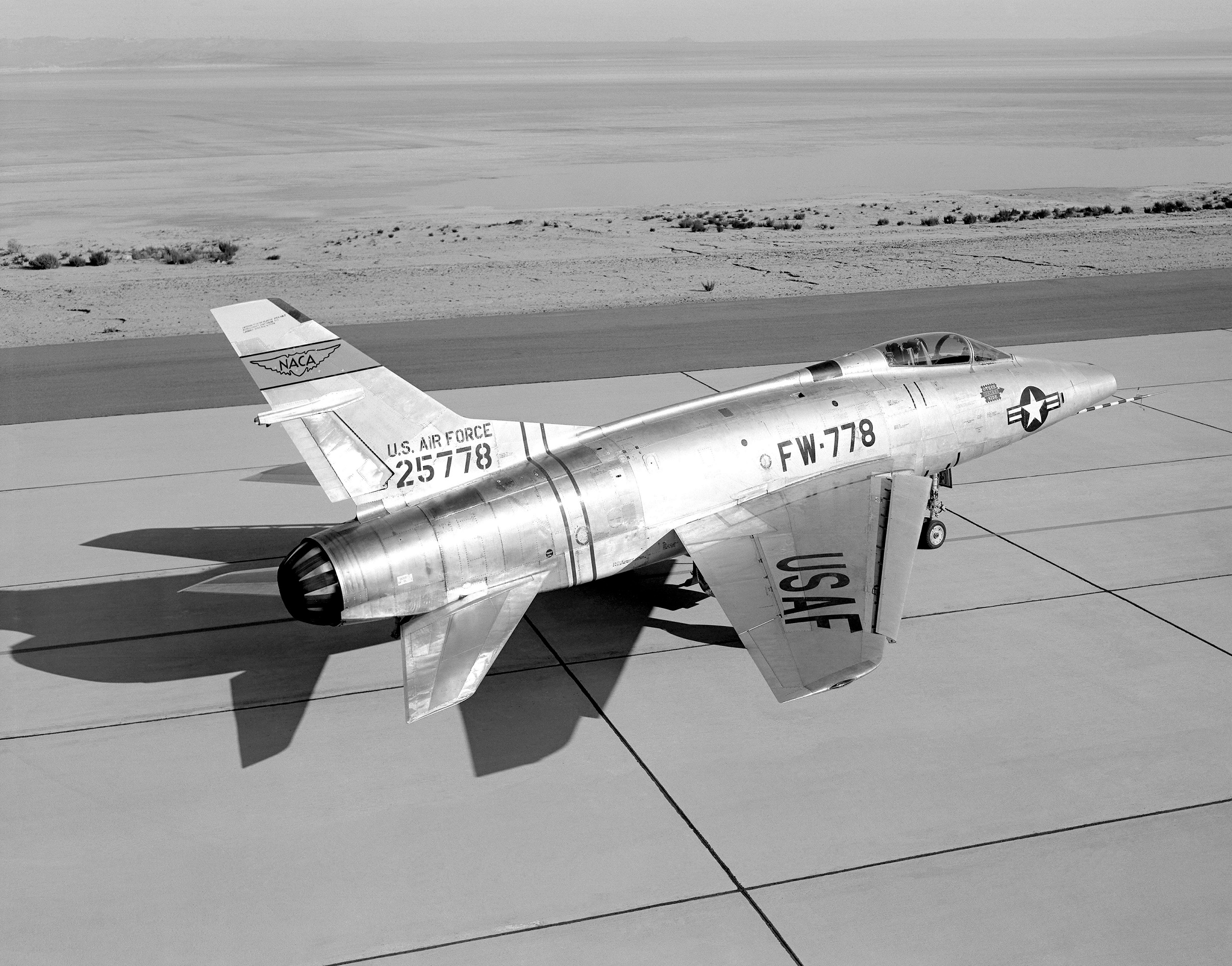 North American Aviation F-100A-5-NA Super Sabre 52-5778 parked on the ramp in front of the NACA hangar, Edwards Air Force Base, California, 1959. (NASA)