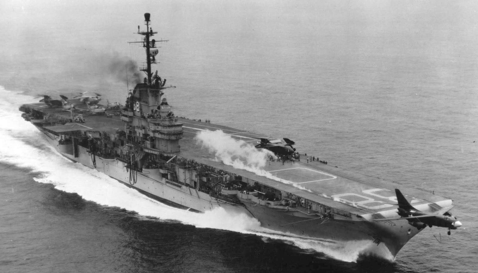 A Douglas A3D-1 Skywarrior is launched from a steam catapult aboard USS Shangri-La (CVA-38) while a second is readied for launch. (U.S. Navy)