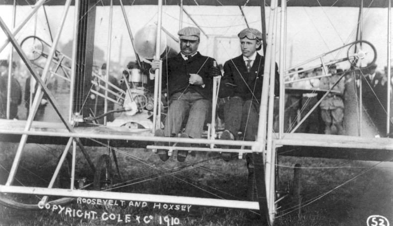 President Theodore Roosevelt with Arch Hoxsey aboard a Wright Brothers airplane at St. Louis, Missouri, 11 October 1910.
