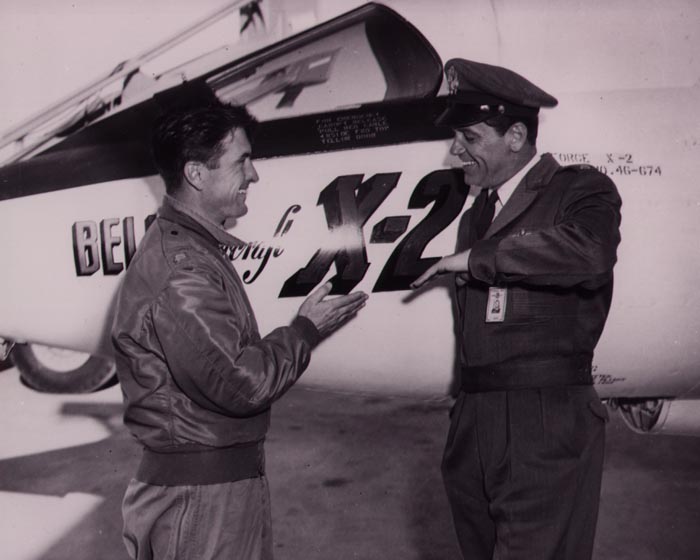 Pete Everest gives some technical advice to William Holden ("Major Lincoln Bond"), with Bell X-2 46-674, on the set of "Toward The Unknown", 1956.