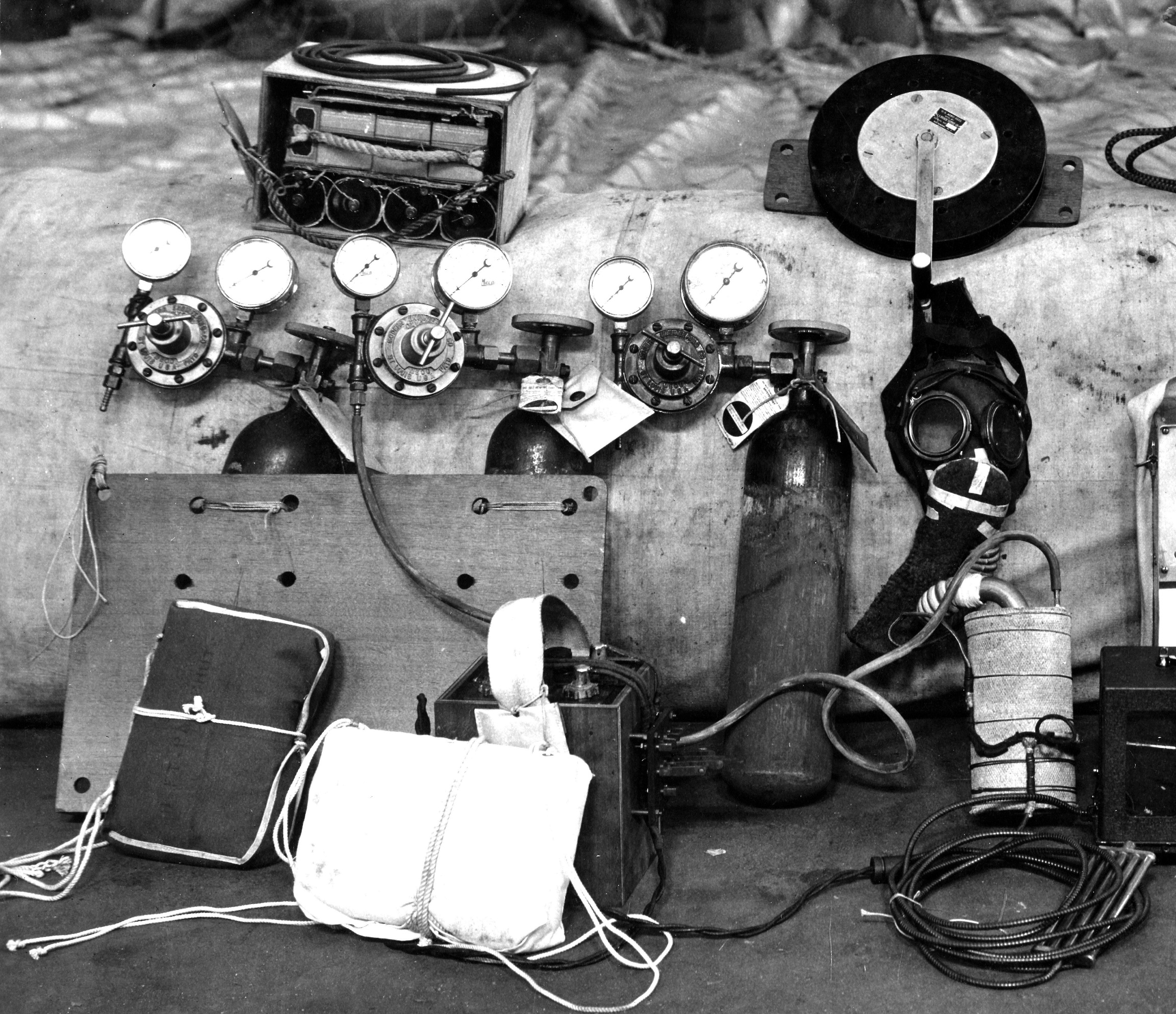 This photograph of the equipment carried in Hawthorne's gondola on 4 November 1927 shows the three oxygen cylinders and breathing mask. (U.S. Air Force)