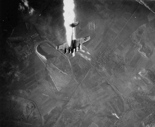 Boeing B-17G-75-BO 43-37877 on fire and going down near Merseberg, Germany, 1314 GMT 30 November 1944. (U.S. Air Force)