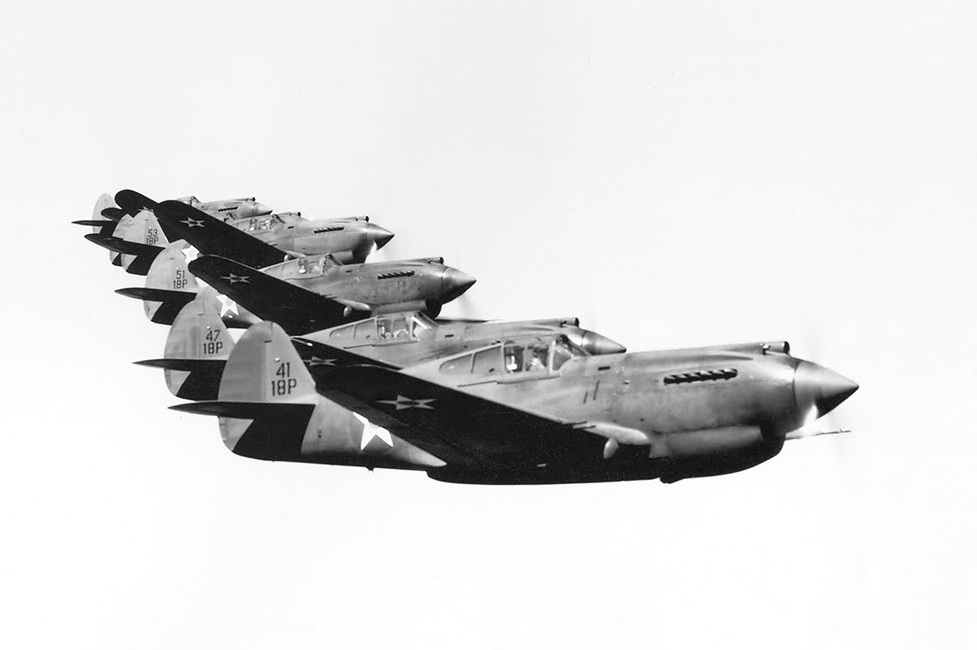 A flight of six Curtiss P-40B Warhawks of the 44th Pursuit Squadron, 18th Pursuit Group, over the Territory of Hawaii, August 1941. (U.S. Air Force)