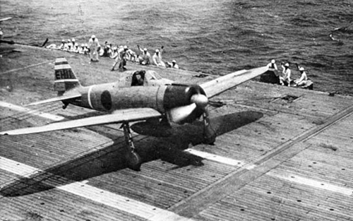 A Mitsubishi A6M2 Model 21 "Zero" fighter takes off from an aircraft carrier of the Imperial Japanese Navy.