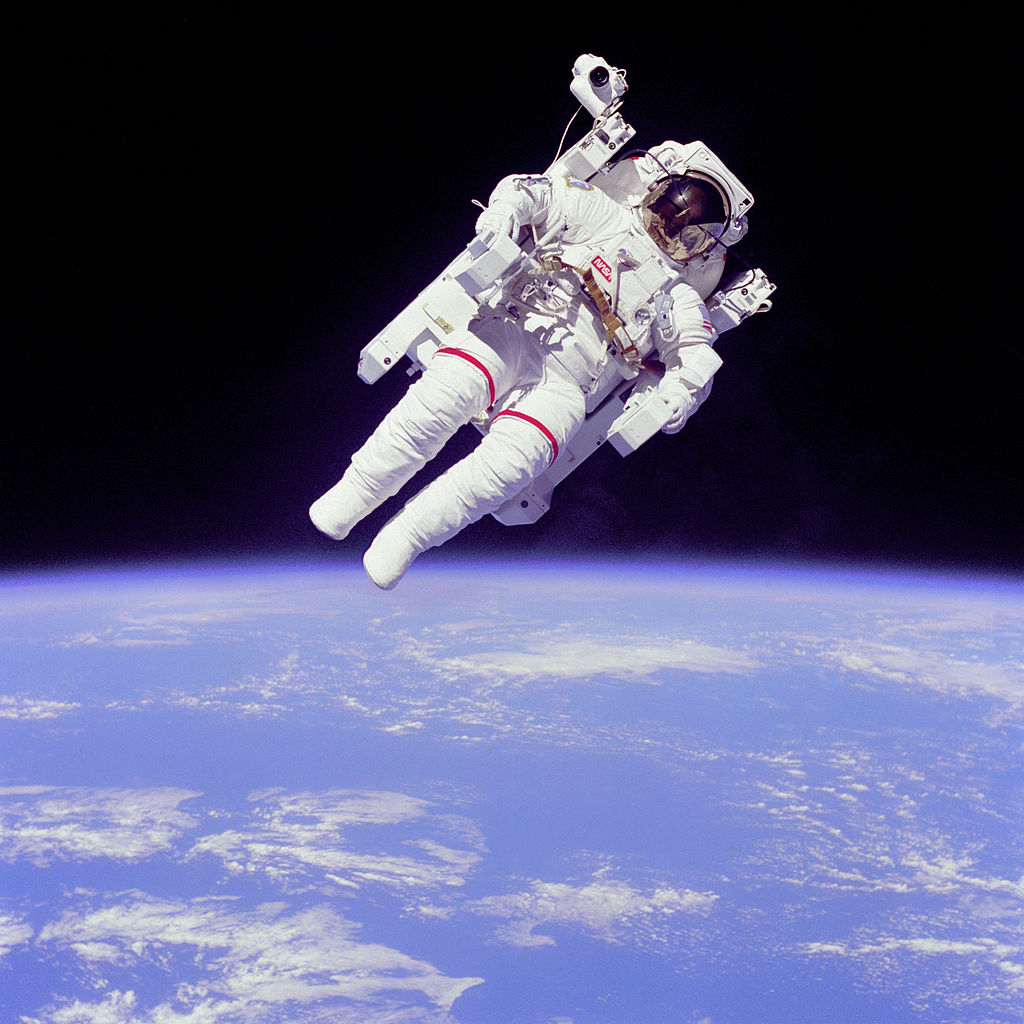 Bruce McCandless outside Challenger in an MMU. (NASA)