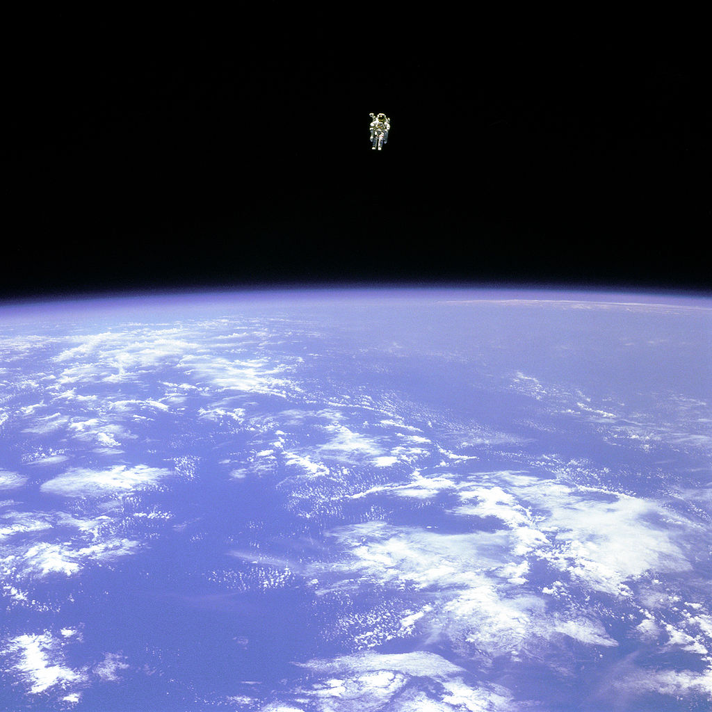 Bruce McCandless at a distance of approximately 320 feet (98 meters) from the space shuttle Challenger, 7 February 1984. (NASA)