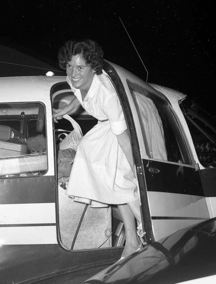 Betty Miller steps out of the Piper Apache at Brisbane, Queensland, Australia, 13 May 1963. (Photograph by Barry Pascoe, from the Courier Mail Photo Archives)