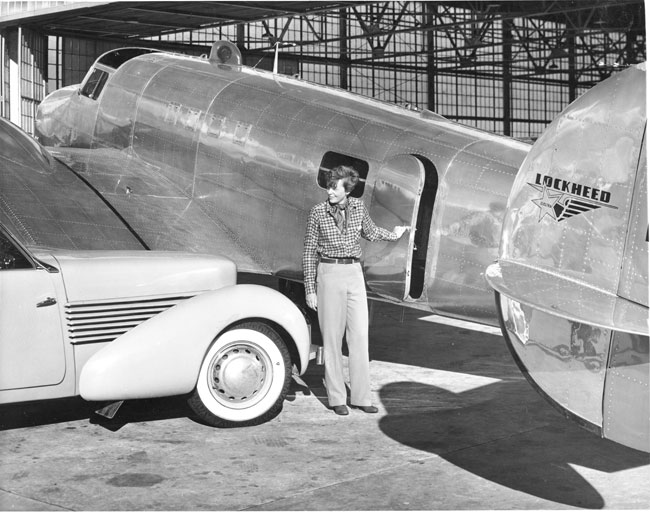 Ameila Earhart with her Electra 10E, NR16020, at Lockheed Aircraft Company, Burbank, California, December 1936. Earhart’s automobile is a light blue 1936 Cord 810 convertible. (The Autry National Center Museum, Automobile Club of Southern California Archives)
