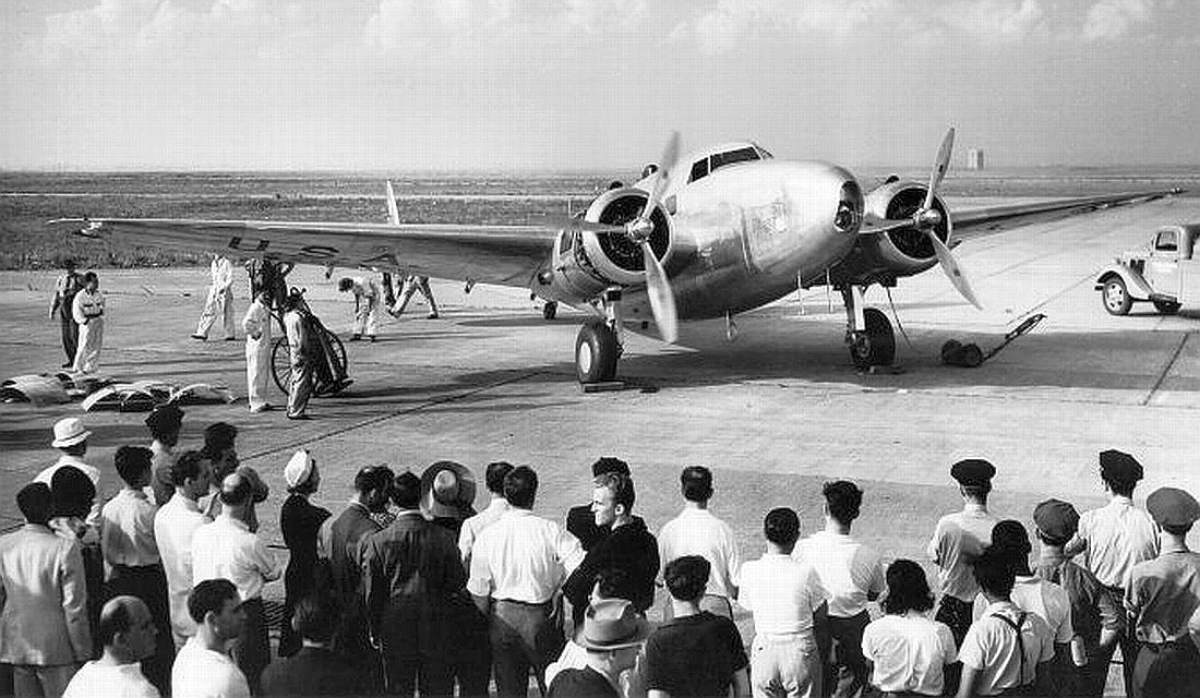 Howard Hughes' Lockheed Model 14-N@ Super Electra, starting its right engine at Floyd Bennett Field, approximately 7:00 p.m., 10 July 1938. (Unattributed) 