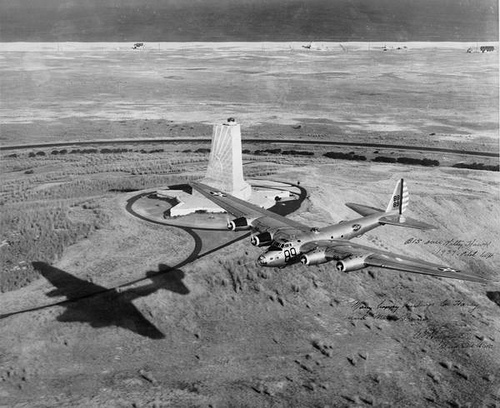 The Boeing XB-15, 35-277, flies past teh Wright Brothers memorial at the kill Devil Hills, Kitty Hawk, North Carolina. (U.S. Air Force)