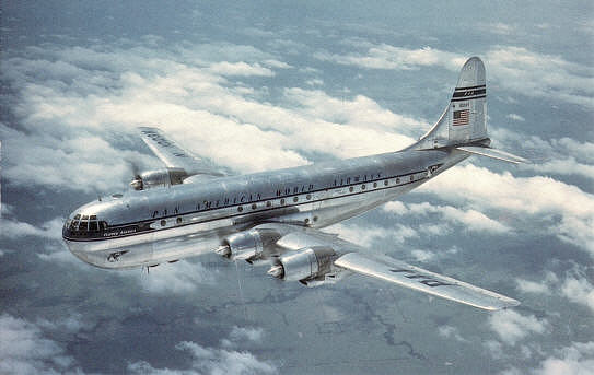 A color photograph of a Pan American World Airways Boeing 377 Stratocruiser in flight. (Pan Am)