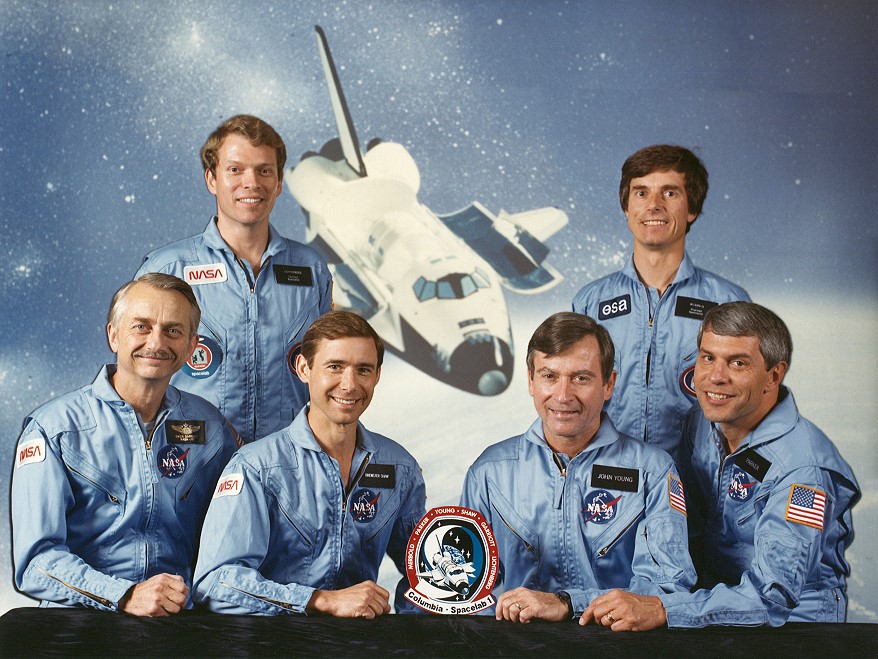 The flight crew of Space Shuttle Columbia (STS-9), left to right, Owen K. Garriott, Ph.D., NASA; LCOL Byron K. Lichtenberg, D.Sc., USAF; LCOL Brewster H. Shaw, Jr., USAF; CAPT John Watts Young, USN (Ret.); Dr. Ulf D. Merbold, ESA; Robert A.R. Parker, Ph.D., NASA.