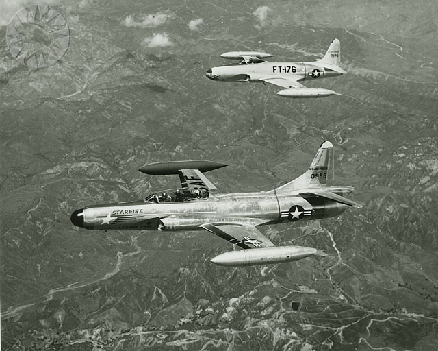 Lockheed F-94C-1-LO Starfire 50-966, the same type airplane flown by Captain Richard Harer, 22 December 1954, is accompanied by Lockheed F-80C-1-LO Shooting Star 47-176 chase plane. (Lockheed)