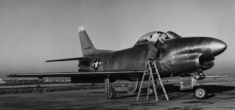 North American Aviation YF-86D Sabre 50-577, the first of two service test aircraft, at the North American Aviation flight line, Los Angeles International Airport. (North American Aviation)
