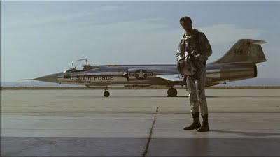 Actor Sam Shepard portrayed Colonel Charles E. Yeager in the 1983 movie, "The Right Stuff", written and directed by Philip Kaufman for The Ladd Company, and based on the book by Tom Wolfe. The airplane behind Mr. Shepard is a Fokker-built F-104G Starfighter, 63-13269.