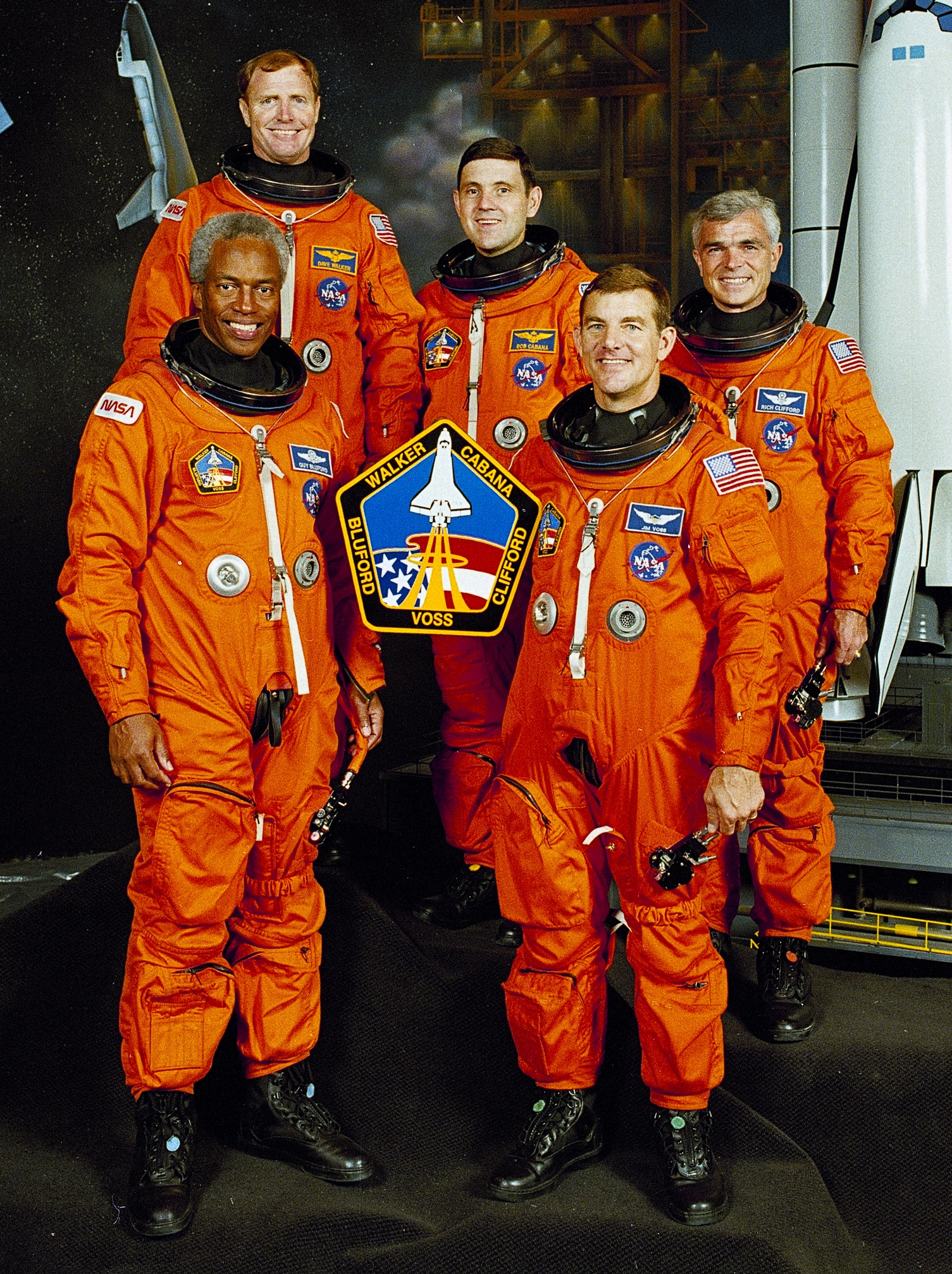 Space Shuttle Discovery (STS-53) flight crew. Front row, left to right: Guion S. Bluford and James S. Voss. Back row, David M. Walker, Robert D. Cabana and Micael R. Clifford. (NASA)