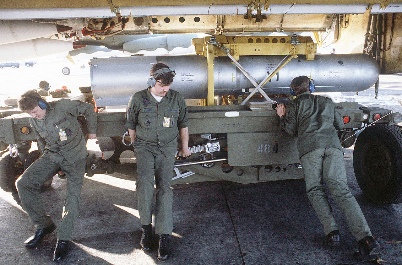 Three airmen position a B28Y1 1.1 megaton thermonuclear bomb for loading aboard a B-52 Stratofortress. (U.S. Air Force)