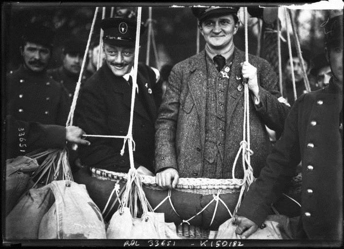 This photograph was taken during the Gordon Bennett Cup race, 12 October 1913. On of the men in the photo is identified as Hans Rudolph Berliner. Unfortunately, the source does not say which one. (Bibliothèque nationale de France)