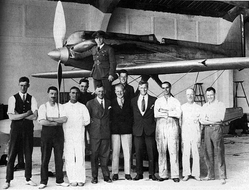 Flight Lieutenant Sidney N. Webster, RAF, stands with his winning Supermarine S.5, N220, at the Woolston factory. Designer Reginald Mitchel is in the front row at center. 
