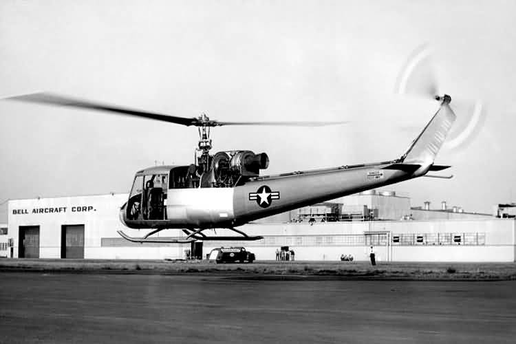 Left rear quarter view of the Bell XH-40 hovering in ground effect at the Bell Helicopter Company plant at Hurst, Texas. (U.S. Army)