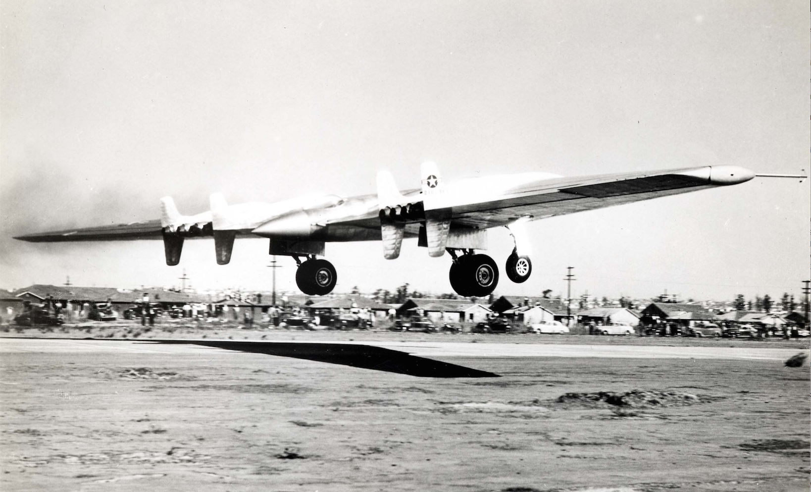 Northrop YB-49 42-102367 takes off from Northrop Field, Hawthorne California. Note teh crowds of onlookers and residential housing along W. 120th Street, on the north side of the airport. (U.S. Air Force)