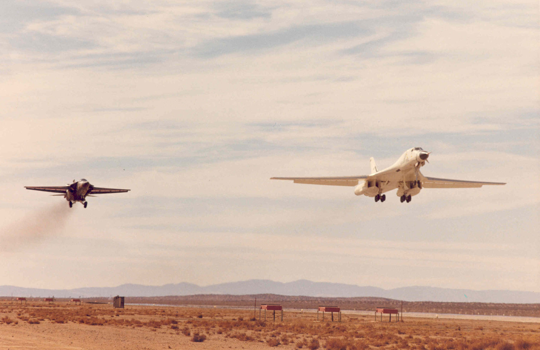 Rockwell B-1A 74-0158 with a General Dynamics F-111 chase plane, landing at Edwards Air Force base. (U.S. Air Force) 