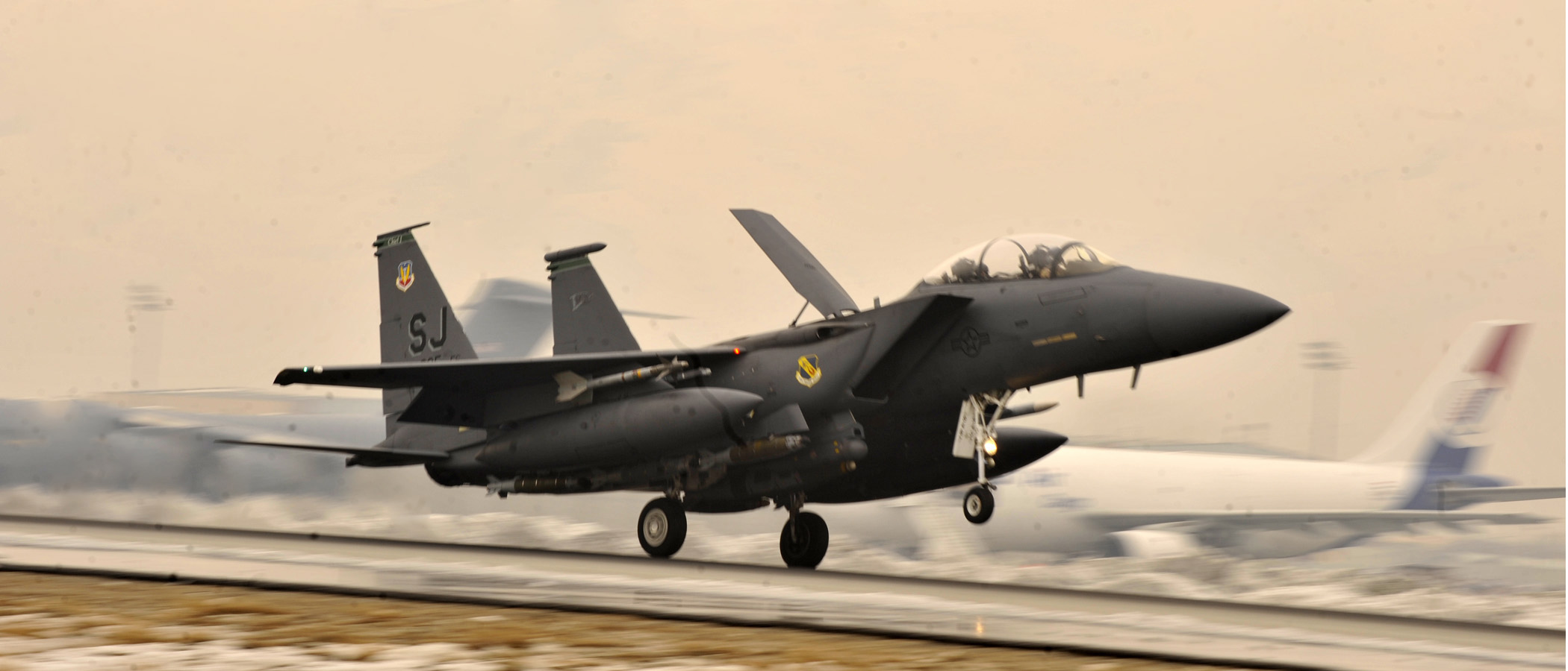 McDonnell Douglas F-15E Strike Eagle 89-0487 lands at Bagram Air Base after passing its 10,000th flight hour, 13 January 2012. (Airman 1st Class Ericka Engblom, U.S. Air Force) 