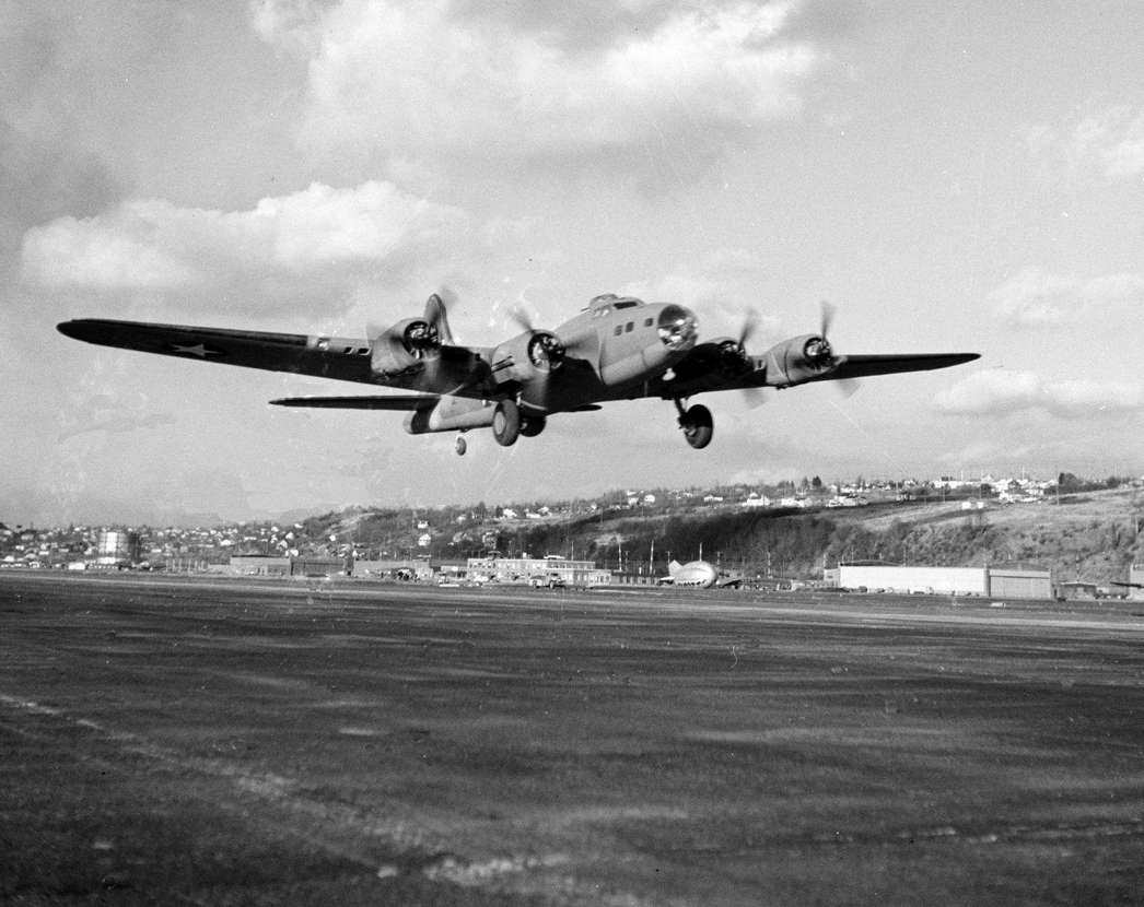 A Boeing B-17F Flying Fortress takes off from Boeing Field, Seattle, Washington, 1942.