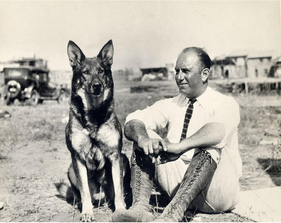 Edward Antoine (“Eddie”) Bellande sits with famed motion picture hero, Rin Tin Tin, ca. 1925. (Unattributed)
