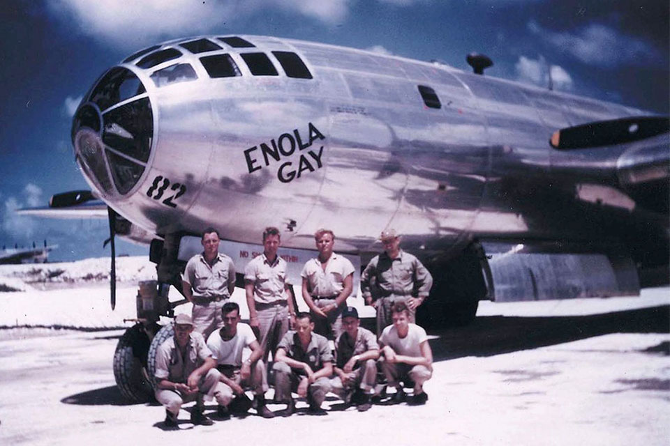 Enola Gay at Tinian, with crew members.