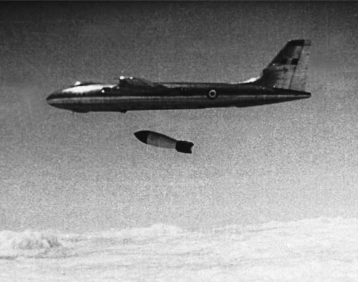 The Blue Danube Mar 1 bomb drops away from Vickers Valiant B.1 WZ366 over the Kite test site, Maralinga, South Australia. (Crown Copyright)