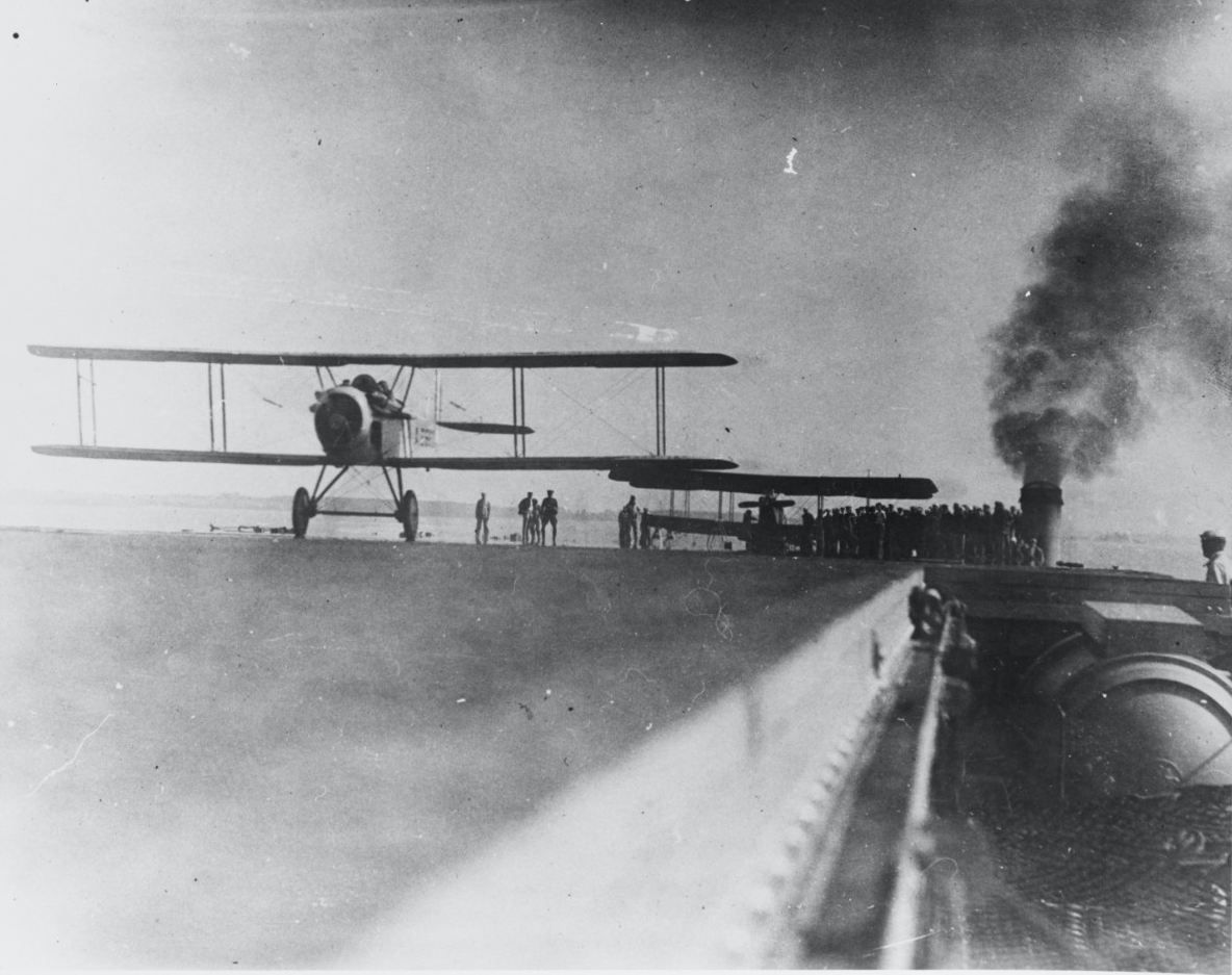A Vought VE-7 taking off from USS Langley, 1922. The second airplane is an Aeromarine. (U.S. Navy)
