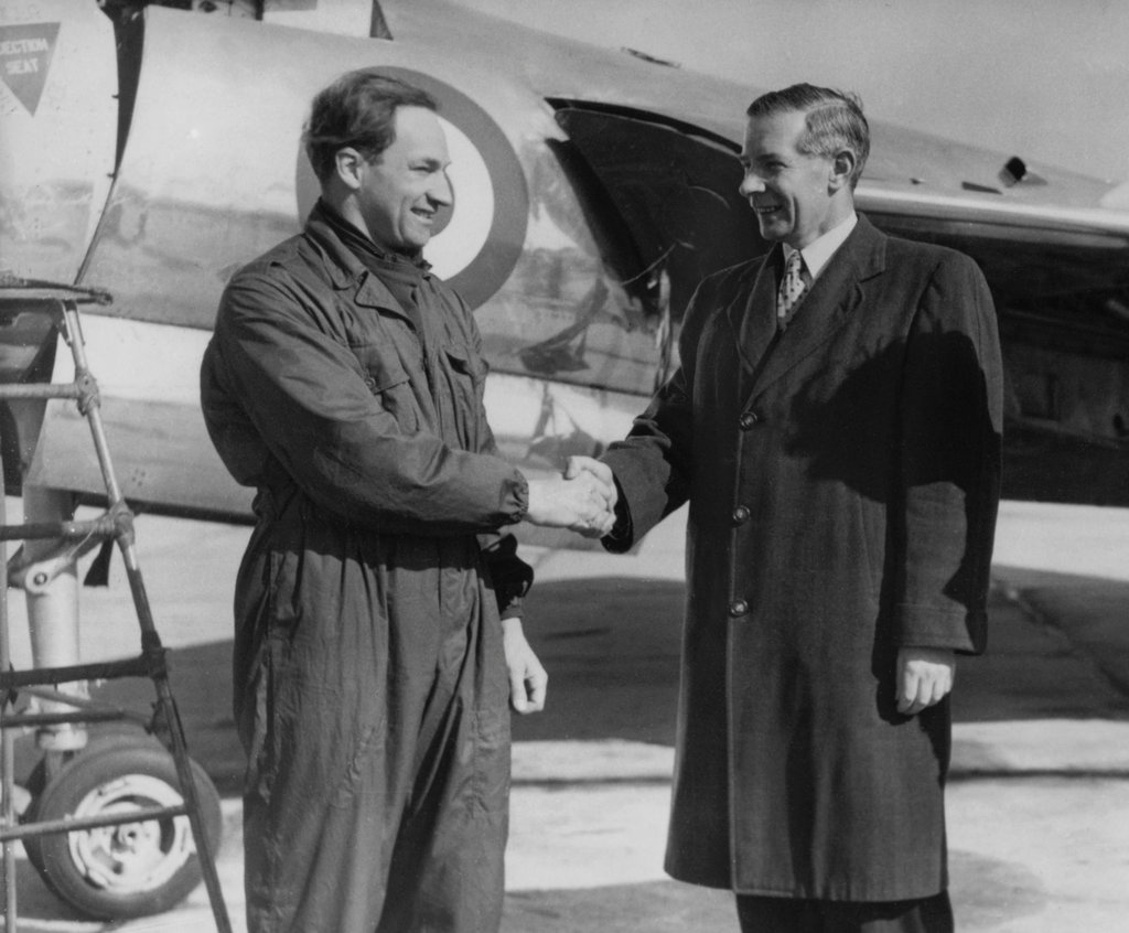 Test Pilot Peter Twist shakes hands with Robert L. Lickey, designer of the Fairey Delta 2. (The New York Times)