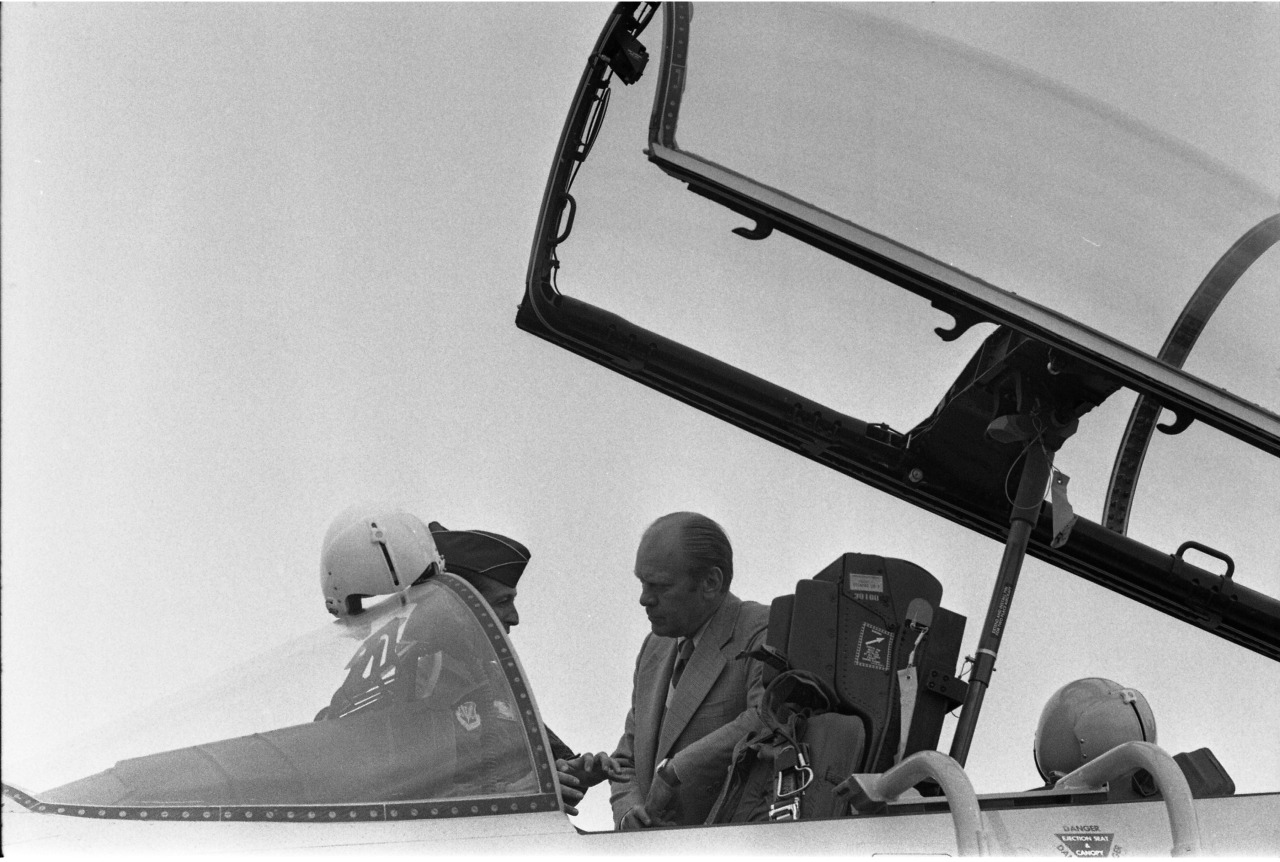 1974, November 14 – Luke Air Force Base – Phoenix Arizona – Gerald R. Ford, Lieutenant Colonel Ernest "Ted" Laudise – looking in cockpit of F-15 Eagle (plane) – Trip to Arizona; Ceremony to Commemorate the Delivery of the First F-15 Eagle Fighter Aircraft - Phoenix, Arizona