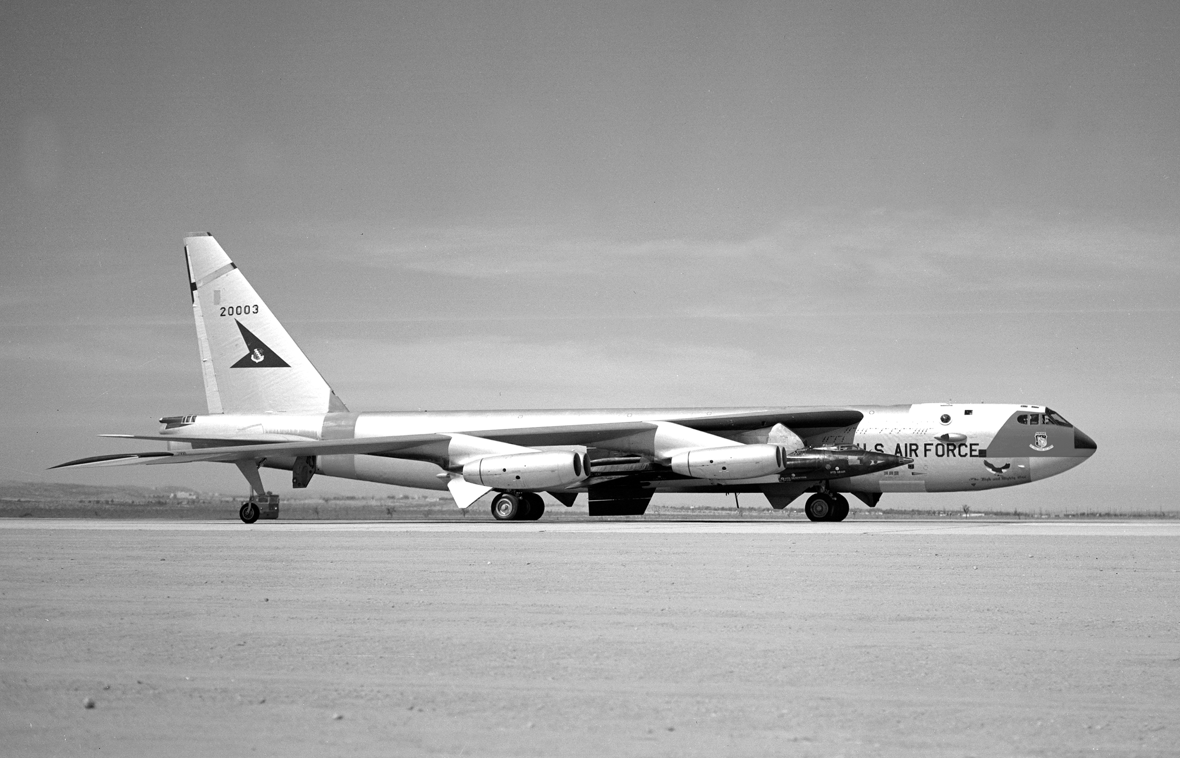 Boeing NB-52A 52-003 with a North American Aviation X-15 56 under its right wing at Edwards Air Force Base. (NASA DFRC EC62 0099)