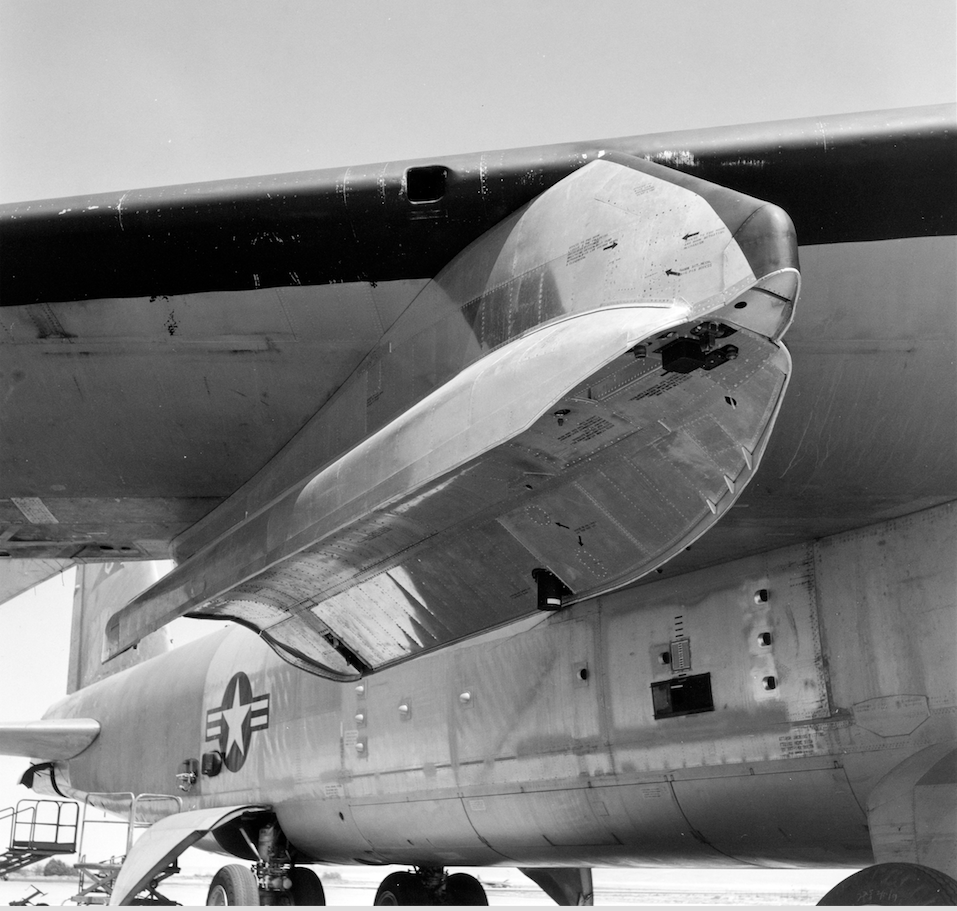 The X-15 was attached to this underwing pylon by three standard Air Force bomb shackles. (NASA)