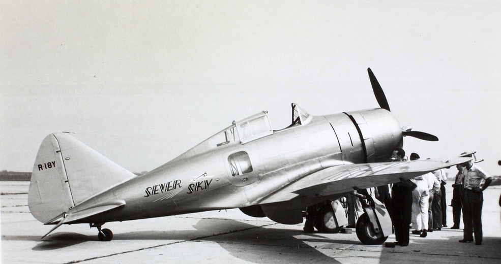  The Seversky's passenger compartment was accessed through a hatch on the right side of the fuselage. (San Diego Air and Space Museum Archives) Jackie Cochran in the cockpit of the Seversky SEV-2S Executive, NR18Y. Note the passenger windows below and behind the cockpit. (San Diego Air and Space Museum Archives)