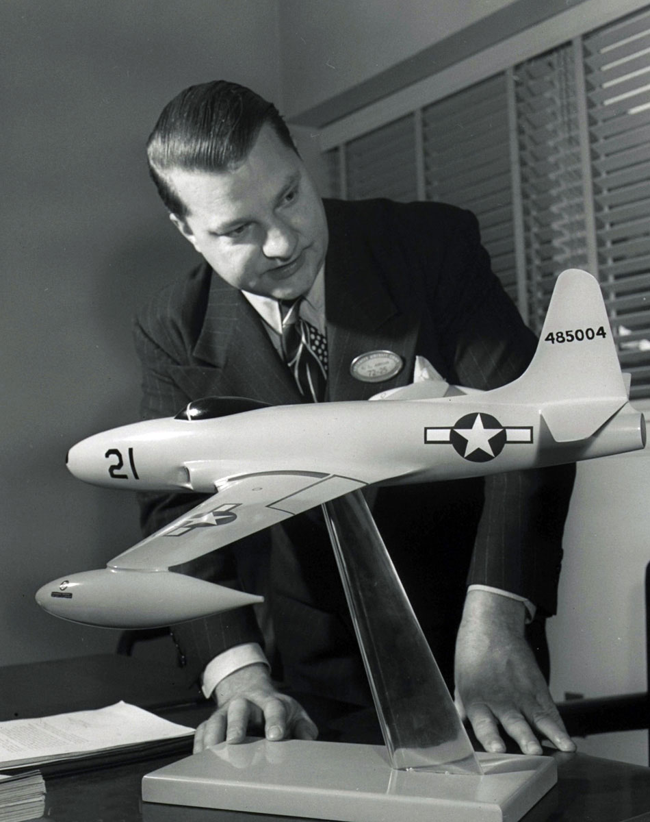 Clarence L. "Kelly" Johnson with a scale model of a Lockheed P-80A-1-LO Shooting Star. Johnson's "Skunk Works" also designed the F-104 Starfighter, U-2, A-12 Oxcart and SR-71A Blackbird. (Lockheed Martin Aeronautical Company) 