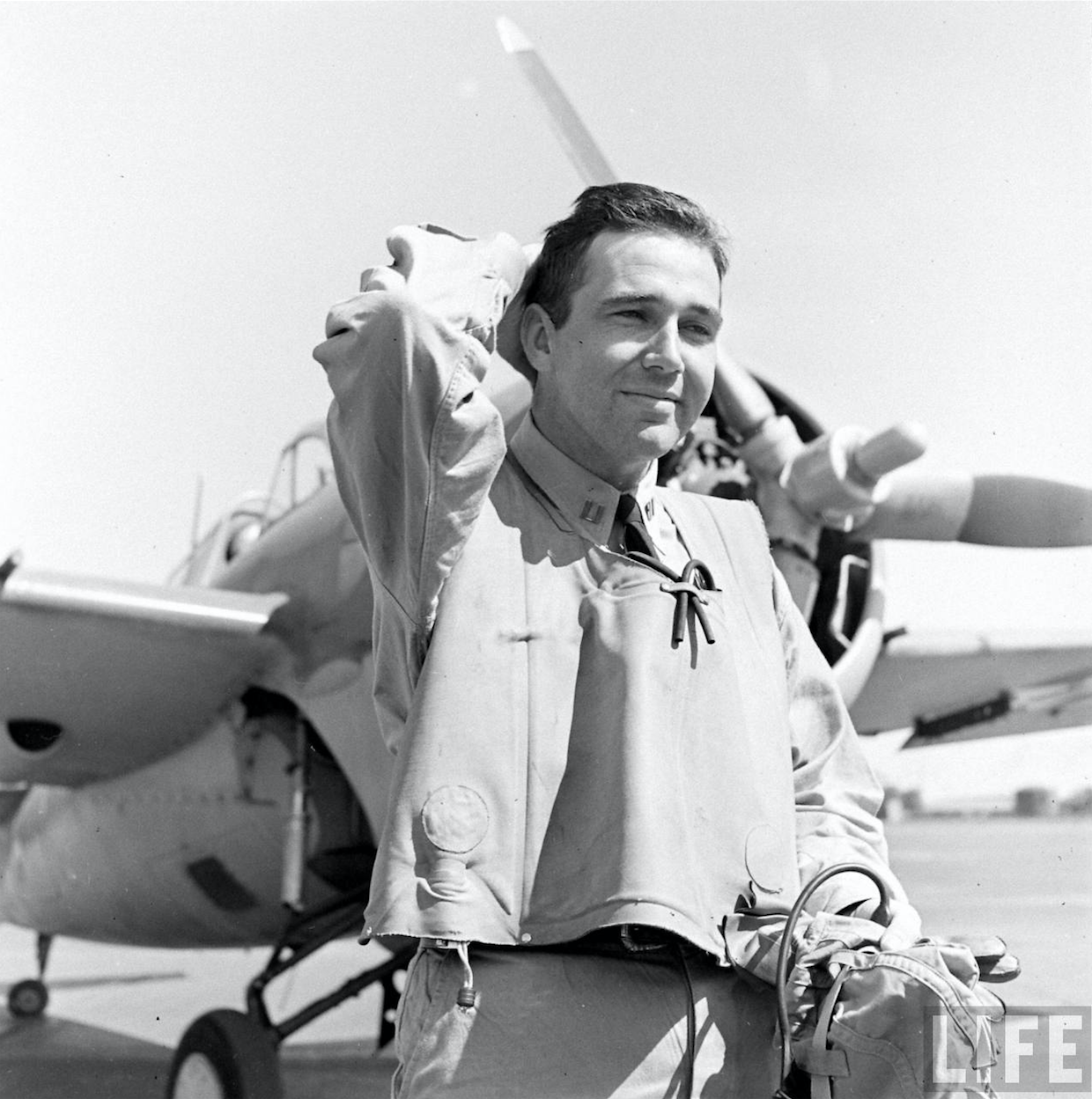 Lieutenant Edward H. O'Hare, United States Navy. A Grumman F4F Wildcat is in the background. (LIFE Magazine)