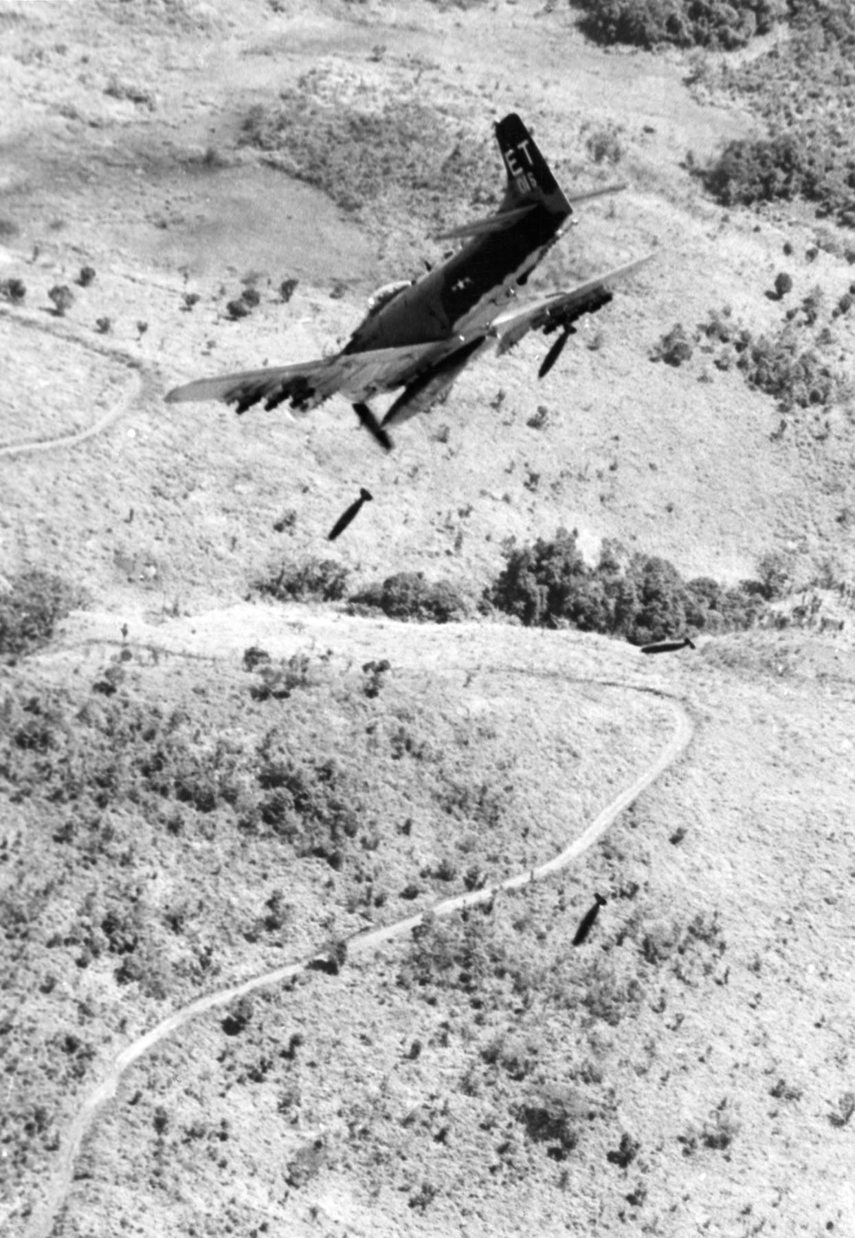A Douglas A-1H Skyraider of the 6th Special Operations Squadron dive bombing a target during a close air support mission, Vietnam, 1968. (U.S. Air Force)