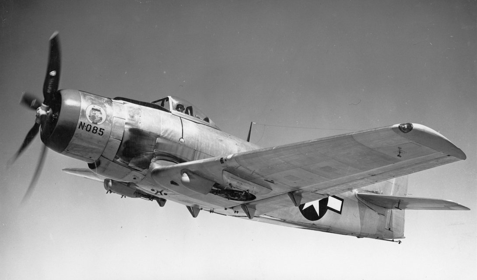 Test pilot Brown in teh cockpit of Douglas XBT2D-1 Dauntless II Bu. No. 9085 during a test flight. (Douglas Aircraft Company)