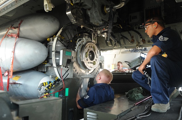 An ordnance crew loads a rotary launcher with 8 cruise missiles into teh bomb bay of a B-52H Stratofortress. (Senior Airman Amber Ashcraft/U.S. Air Force)