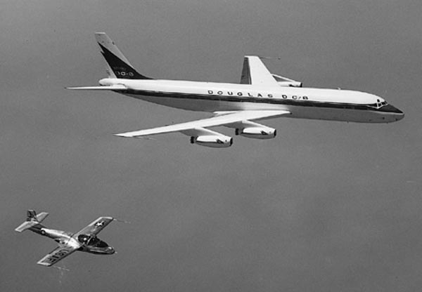 Douglas DC-8 N8008D accompanied by a Cessna T-37. (Douglas Aircraft Company)