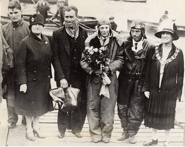 Amelia Earhart with pilot Wilmer L. Stultz and flight mechanic Louis E. Gordon at Southampton, 20 June 1928. Amy Phipps Guest is at the left of the photograph. The Hon. Mrs. Foster Welch, Mayor of Southampton, is on the right. (Purdue University Libraries, Karnes Archives and Special Collections via the BBC)
