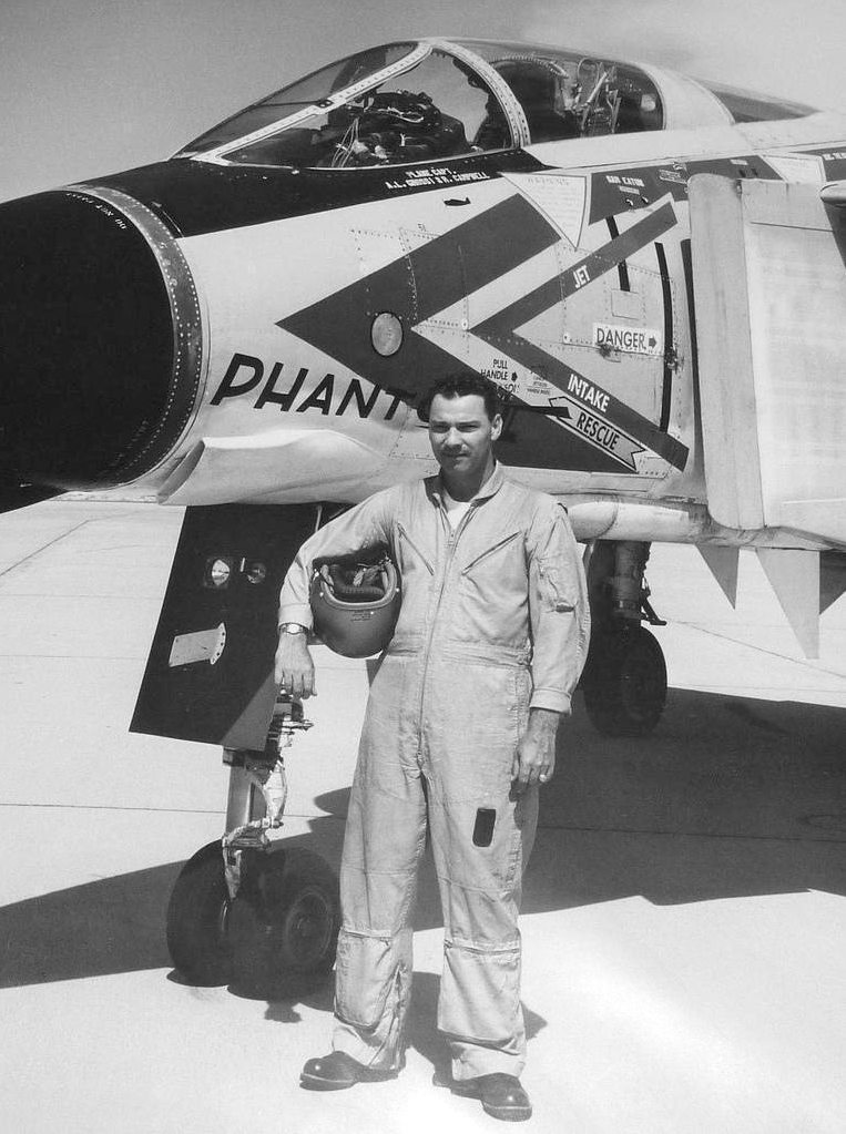 Commander John F. Davis, United States Navy, with a McDonnell F4H-1 Phantom II. Note the F6F-5K drone “kill” mark under the windshield. (U.S. Navy)