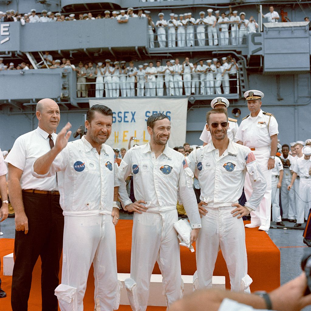 The crew of Apollo 7 on the flight deck of USS Essex (CVS-9), 22 October 1968. Left to right, Captain Walter M. Schirra, USN; Major Donn F. Eisele, USAF; Major R. Walter Cunningham, USMC. (NASA)