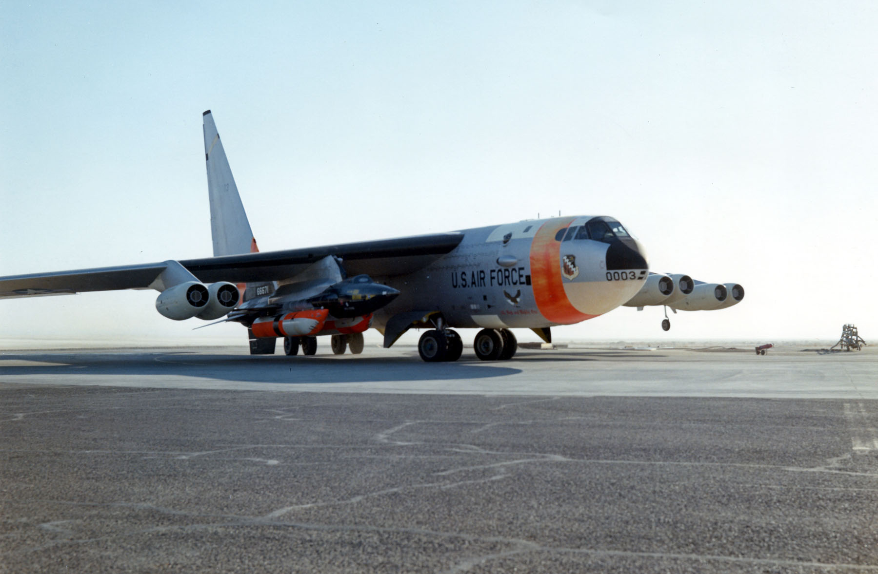 Boeing NB-52A Stratofortress 52-003, The High and Mighty One, with North American Aviation X-15A-2 56-6671 mounted to the pylon under its right wing. The external propellant tanks have been brightly painted to aid tracking after they are jettisoned. (U.S. Air Force)