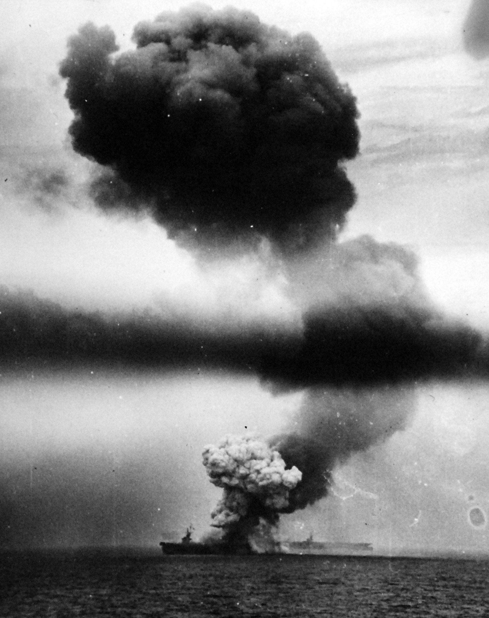 USS St. Lo (CVE-63) burning in Leyte Gulf, 25 October 1944. (National Archives and Records Administration 80-G-47041)