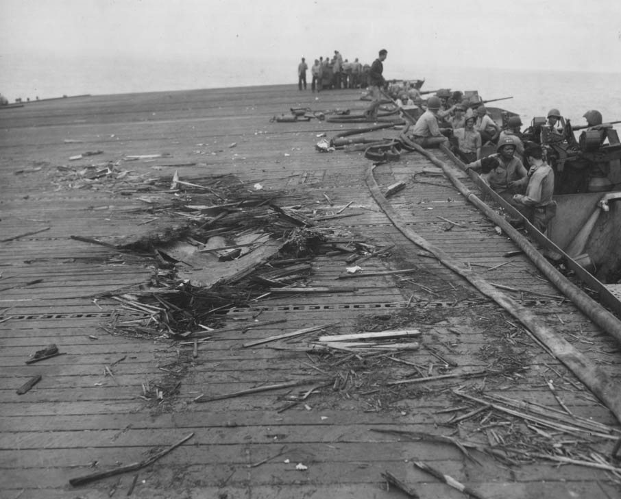 Damage to the flight deck of USS Kalinin Bay (CVE-68), 25 October 1944. (National Archives and Records Administration 80-G-270510)