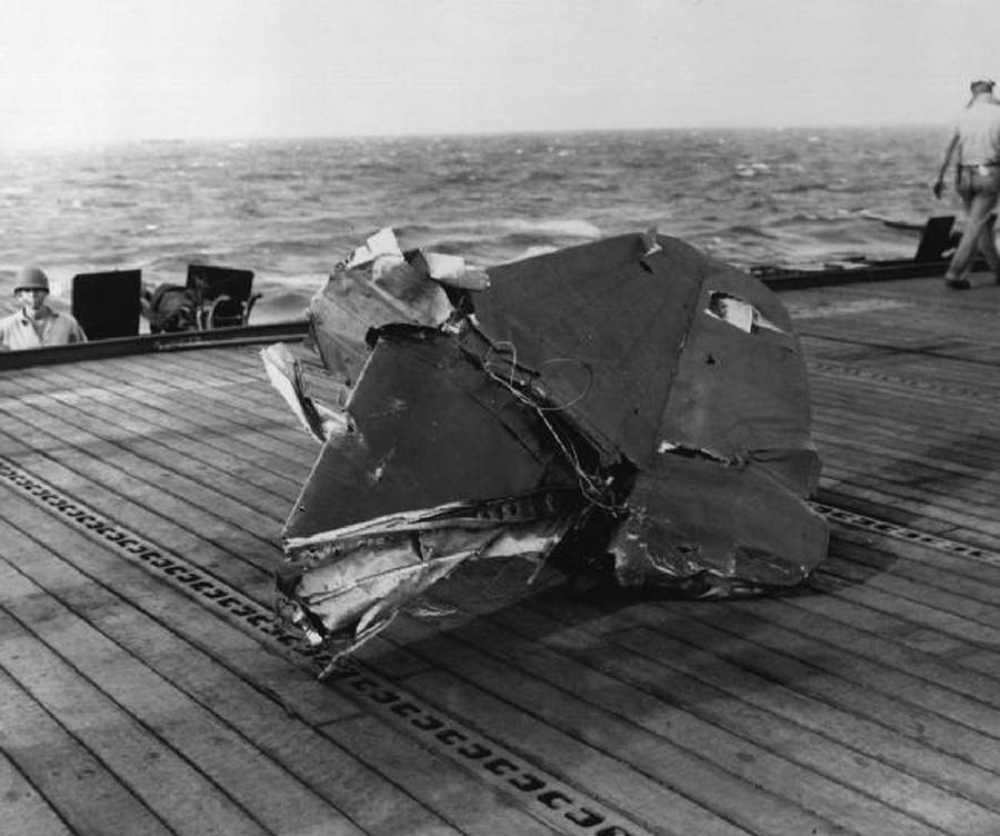 The remains of a Yokosuka D4Y Suisei dive bomber aboard USS Kitkun Bay (CVE-71), 25 October 1944. (United States Navy)